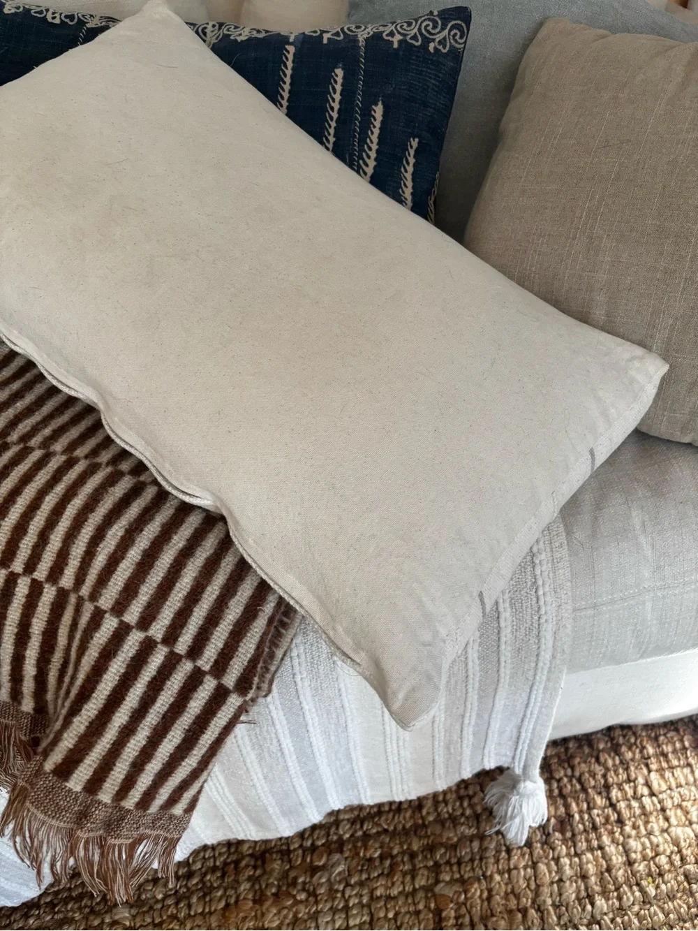 Cream Decorative Lumbar Pillow with Subtle Gray Stitching